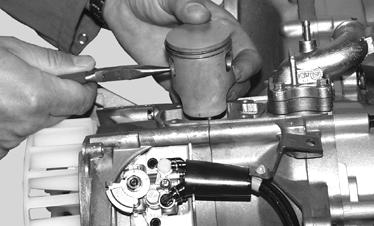 They (it) must be new, - Oil the piston and the cylinder barrel, - Make sure that the opening of the piston rings is opposite the positioning lugs, - Insert the cylinder and lower