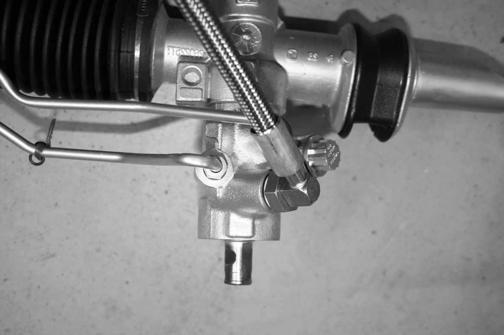 step 17 Now proceed to attach the outer tie rod ends to the steering arms (spindles)before torquing, read the following details NOTE: the flange below the taper may not seat against the steering arm-