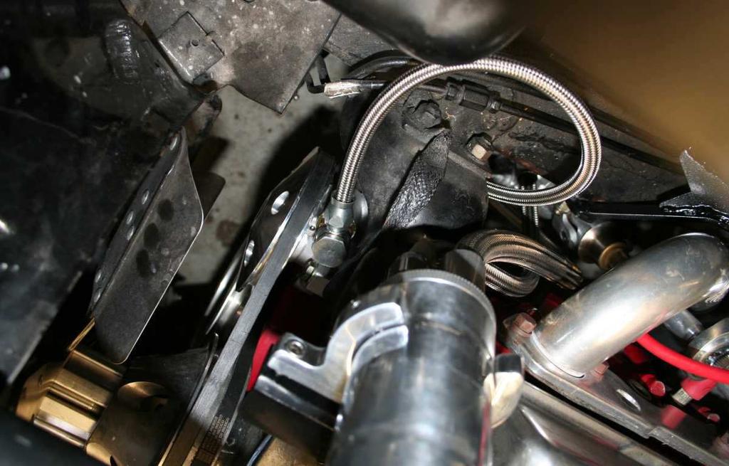 (the largest hose) Be sure to lubricate all O-rings with a small amount of power steering fluid before installation Now connect the high pressure line from the top of the pump to the lower,