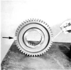3. Mark any two adjacent teeth on the reduction gear and 5. Install the washer on the shaft and against the gear with then mark the two teeth directly opposite.