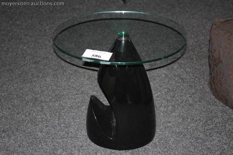 29 1 glass side table, with black lacquered base, dimensions: 540 x 430 xh530mm, 50 30 1