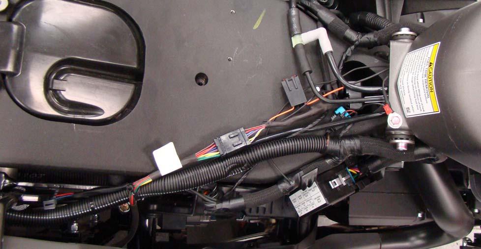 Plug tour box wiring into main harness and secure wiring as needed with cable ties. 2. Tighten all tour box mounting hardware. 3. See Fig. 3. Plug trike body harness into main OEM harness.