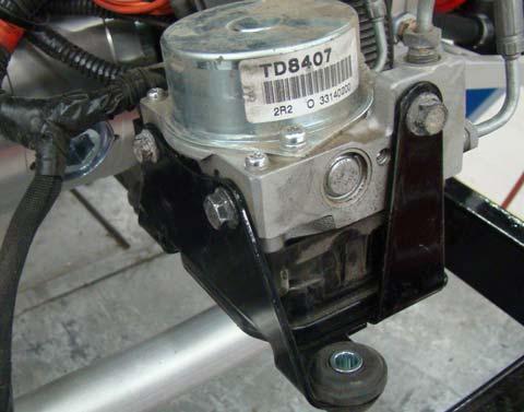5. See Fig. 3. Install new bracket to ABS pump using original hardware. (1) ABS Bracket S002350 6. See Fig. 4.