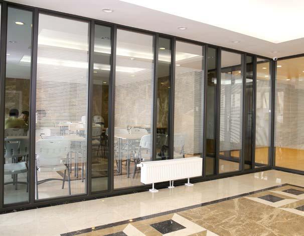 Partition walls The best solution for dividing space Hörmann partition wall is made of steel frame and high-quality tempered glass.