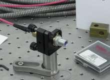 optics; (4) fiber optics; (5) laser plug. 1 5 4 4 5 2 4 3 Figure 4. The components of the system of the pumping laser pulse beam.