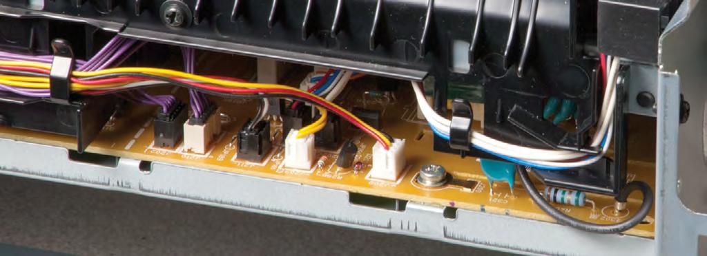 Note that the position of the front screws differs on the different printer models: the 1160/1320 printers have a chrome self-tapping screw on the