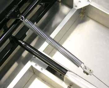 A conduit retainer is included with the trim kit to terminate and secure the end of the cable housing. These photos detail a typical cable installation in a Sonex airframe.