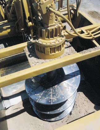 Auger Arrangement Excellent self-loading capability in a wide range of material. Versatility. The auger has a wide material appetite ranging from rock to free flowing material such as sand.