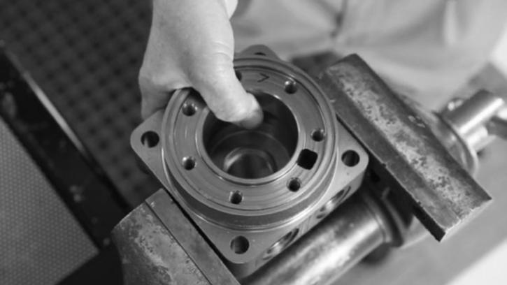 flange. SEE FIGURE 29. Figure 29 Press in inner bearing and assemble washers & seal 5.