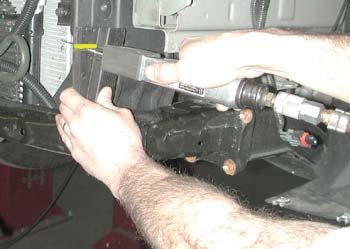 Also, trim the flange on the passenger side using the yellow marker line as a reference (Fig.L). 11.