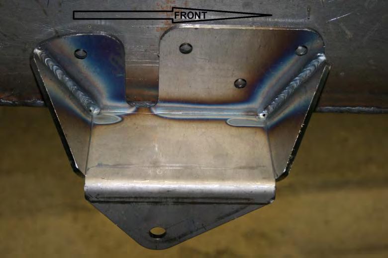 Install the leaf spring brackets in the same manner as the originals by bolting them onto the outside and bottom of the rail. We will be reusing the original spring bracket holes.