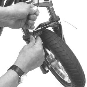 tube) from the brake arm. Scooters equipped with disc brakes do not need the cable detached. 2.