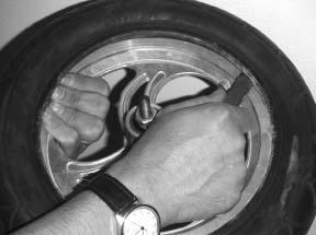 (Ref Photo A, B, C) 4. Remove the tube from the tire. Photo B 5. Slightly inflate the tube in order to inspect for leaks or punctures. Patch or replace the tube as necessary. 6.