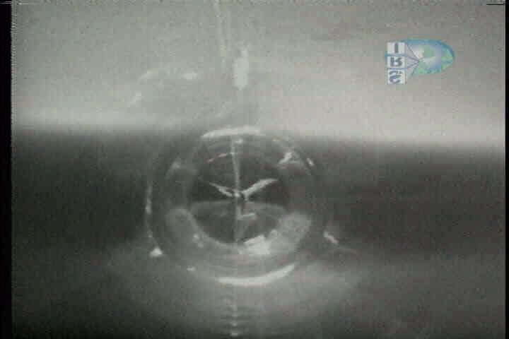 Figure 4 - On-Board Camera View From Inside the Hull Looking Toward the Tail. Balloon is at 22 km altitude at this point. of 5 different times.
