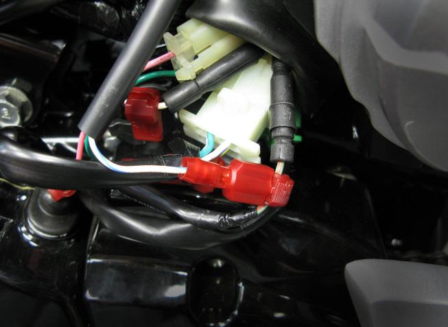 7>CONNECT (CONT.) 7.2 1. Locate the factory neutral connector, which has a single green / red wire and is inside the rubber boot. 2.