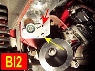Now you can put the second bolt back into the belt tensioner (the Red