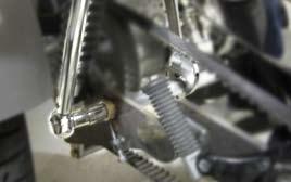 17. Adjust belt tension to factory specs.