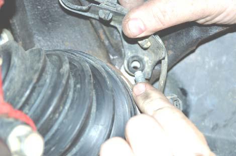 See PHOTO 37. 48. Using a 35mm socket reinstall the factory axle nut, torque to 174ft. lbs.