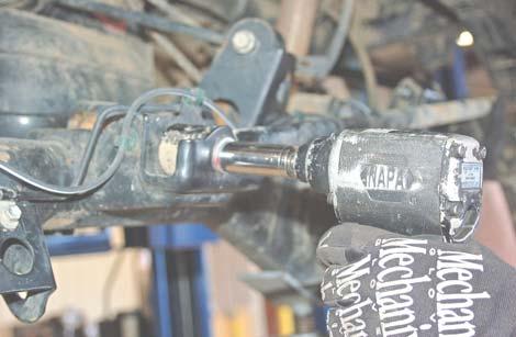 Be sure to support the rear axle while the shocks and springs are being removed with jack stands. 4.