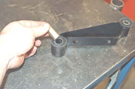 Using the 14mmx25mm bolt and washer from 1770bag3, bolt the differential to the tab on the front cross