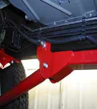 See I-TJ68SP instruction for OEM rear step bar nut insert on the 3rd mounting bolt & skid plate modifications. the outside of the frame.