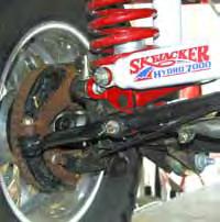 Use the 1/2" x 2 1/2" flat socket head bolt & stover nut to bolt the new Skyjacker bracket to the track bar.