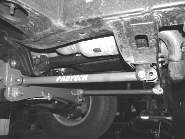 Rear Suspension Instructions: 39. Jack up the rear end of the vehicle and support the frame rails with jack stands. Supporting the rear differential remove and discard the rear shocks, save hardware.