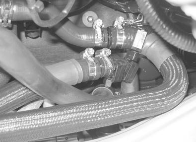 engine outlet A () Angle bracket () 9 mm dia.