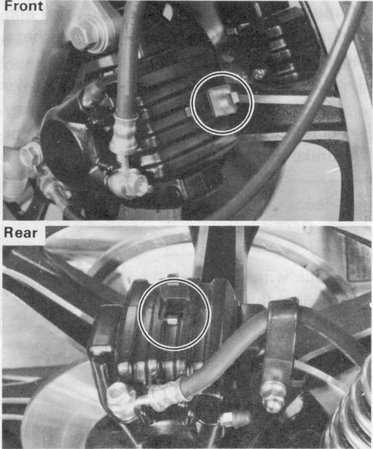 3. Secure the adjuster lock nut. 4. Loosen the brake rod downward until there is noticeable free play between rod and master cylinder. 5.