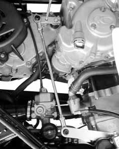 5. Turn the rod (2) clockwise or counterclockwise until the drive select lever (6) into the "N" position of the shift guide and tighten the locknuts, then pull out the standard/phillips screwdriver.