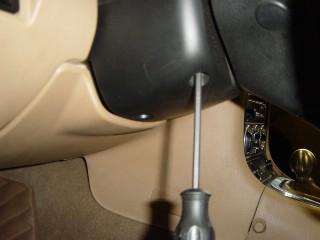 Photo 3-A: Remove the steering column cover Photo 3-B: Remove the bezel by pulling to release 15.