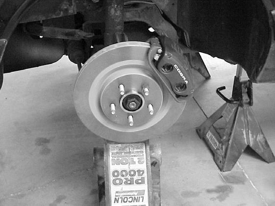 STEP 28: Install rotors (Items 11, 12) and calipers (Items 13, 14).