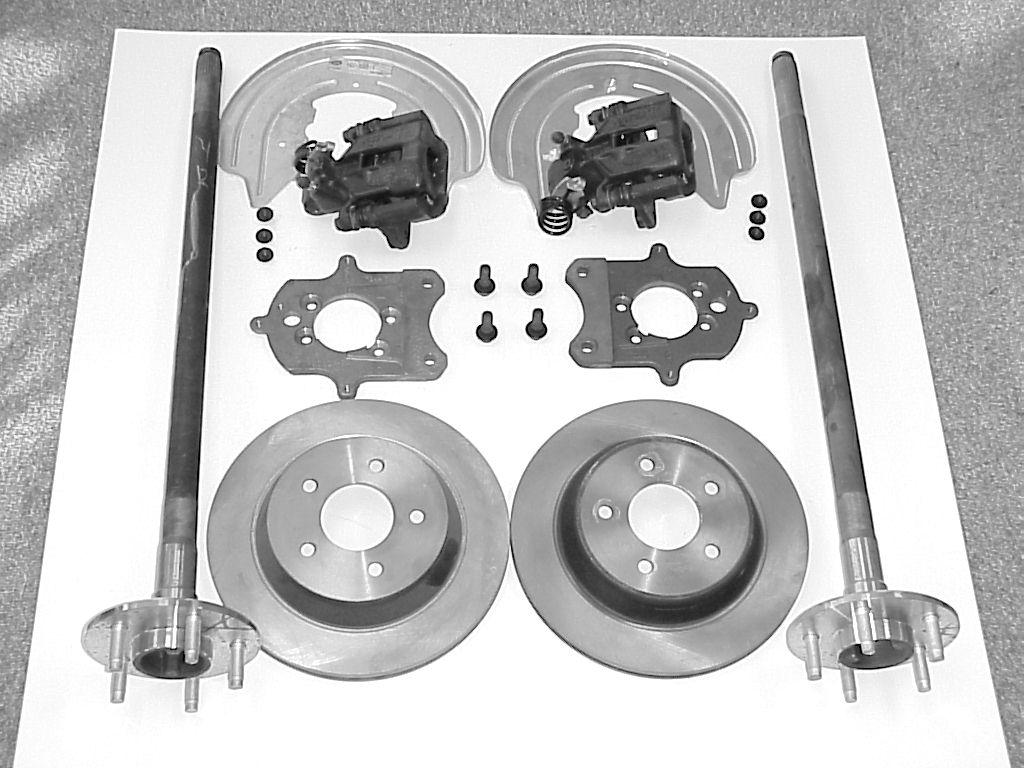 REAR BRAKE : Note: Refer to the shop manual for the recommended procedures to remove and install axle shafts, rear brake