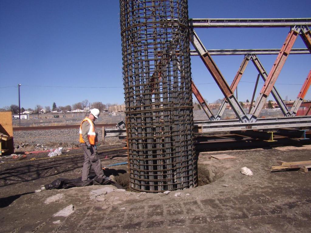 Construction Progress Worker at Moffat Flyover Bridge supervises
