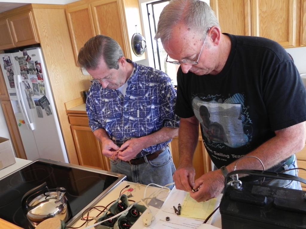 Ron and Gordy setting up The plan was to use the kitchen oven as a calibrated heat source.
