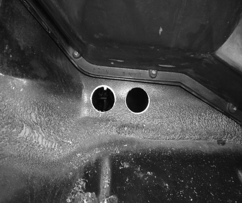 PAGE 7 6. Pull the carpet back on the passenger side and locate the area for the hoses to go through the firewall. The holes will have to be drilled with a 1.25 hole saw.