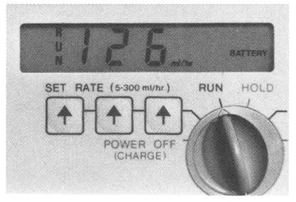 NOTE: IF ALARM SOUNDS, turn pump dial to HOLD. Correct alarm condition indicated by visual display. Then turn pump dial to RUN to restart feeding. (For explanation of alarms, see page 7.
