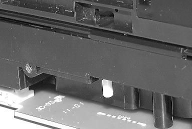 4 Reassembling the tray. Insert carriage # above CD-drive. Attention: The cartridges are different (see picture ).
