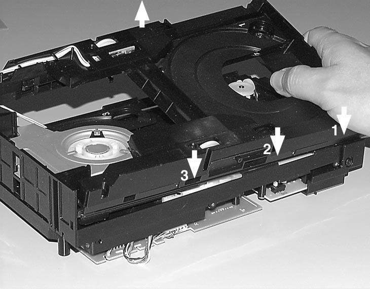 . Lift clamper and insert carriage # above CD-drive.