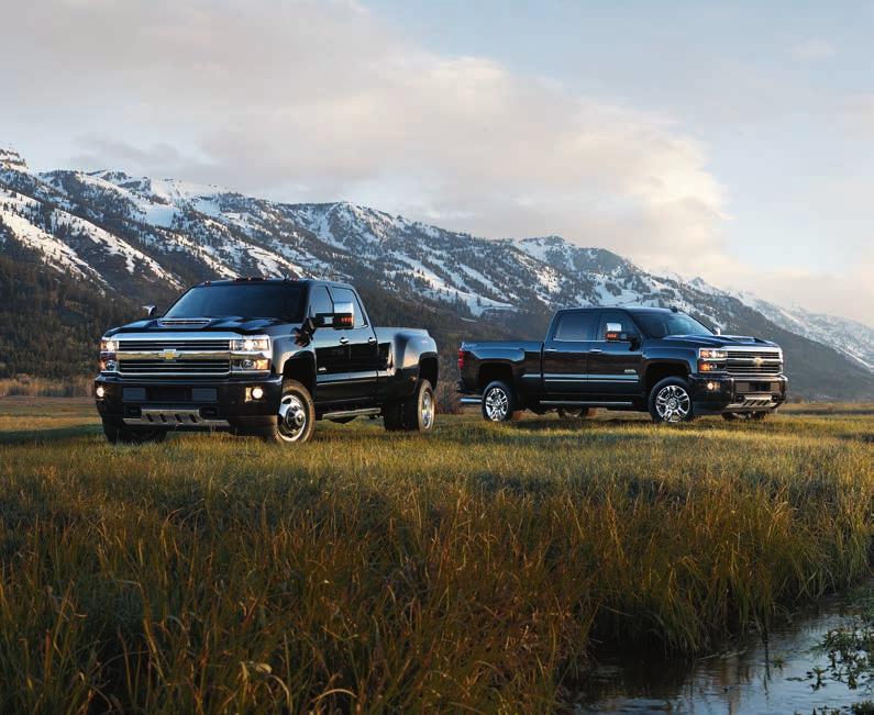 HIGH COUNTRY Silverado 3500HD Crew Cab Long Box High Country 4x4 DRW in Black with available features and Silverado 2500HD Crew Cab Standard Box High Country 4x4 in Black with available features.