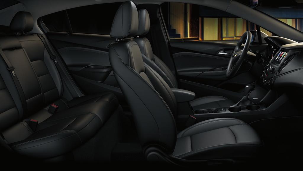 Cruze Premier Sedan interior in Jet Black with leather appointments and available features. 1 The system wirelessly charges one PMA- or Qi-compatible mobile device.