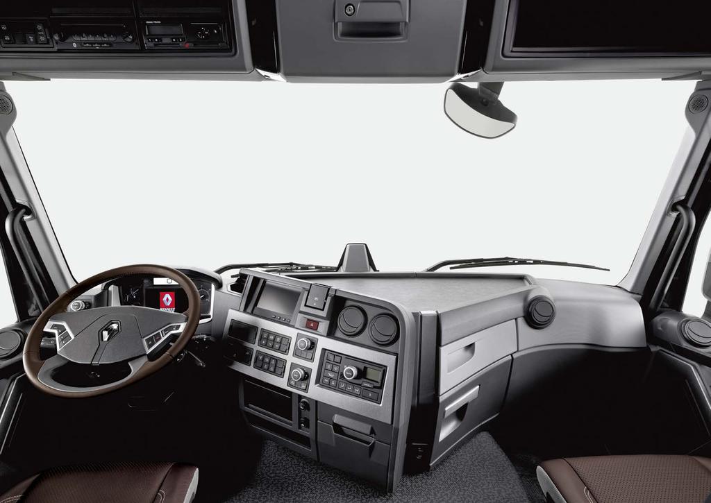 RENAULT TRUCKS_ 28 29 RENAULT TRUCKS_ EVERYTHING WITHIN REACH The wrap-around dashboard provides useful controls within easy reach. Automatic equipment lets the driver concentrate on the job in hand.