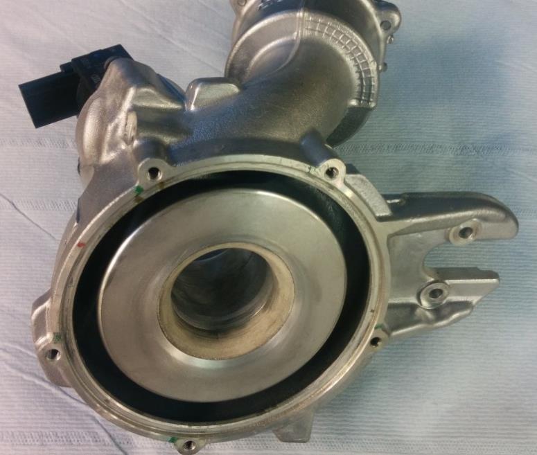 between manifold and turbocharger C15-6)