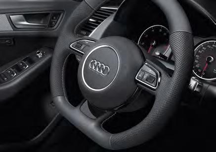 multifunction flat-bottom sport steering wheel as the first sign of this.