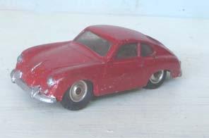 4.42 182 Porsche 356a Coupé. Red over-paint of original red. Silver spun hubs.