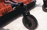 Wheel axles are attached by heavy duty pivot pins with replaceable bushings that extend through the cutter strongbacks.