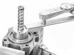 Be sure the valve housing, adjuster locknut and bearing adjuster threads are clean and free of any staking burrs that would impede the locknut from turning freely on adjuster