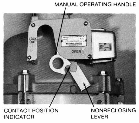 Operating levers and indicators The operating levers and indicators for the reclosers are located under the sleet hood (Figure 3). This handle is trip-free.
