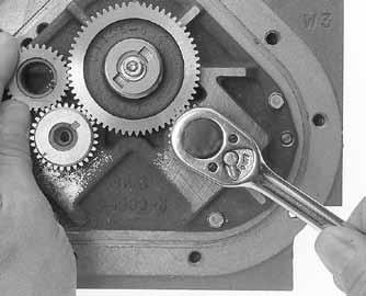 The timing mark on the displacement rotor gears is stamped on a space between two gear teeth. You may need to remove the gears and reposition them several times to line up the timing marks correctly.