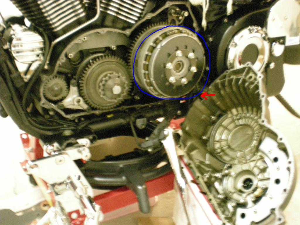 6. The blue circle is the target area. Really simple from here on just remove the six bolts, the retainer ring, spring and pressure plate.